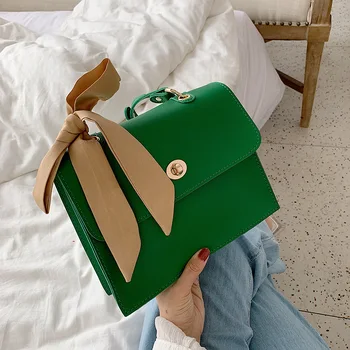 Summer new PU leather women's simple retro solid color silk scarf bow shoulder bag wild large capacity messenger bag briefcase
Summer new PU leather women's simple retro solid color silk scarf bow shoulder bag wild large capacity messenger bag briefcase