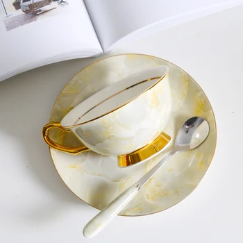 Euro Luxury Bone China gilded coffee cup sets Porcelain tea cup set Afternoon tea party creative wedding gift office drink ware
Euro Luxury Bone China gilded coffee cup sets Porcelain tea cup set Afternoon tea party creative wedding gift office drink ware