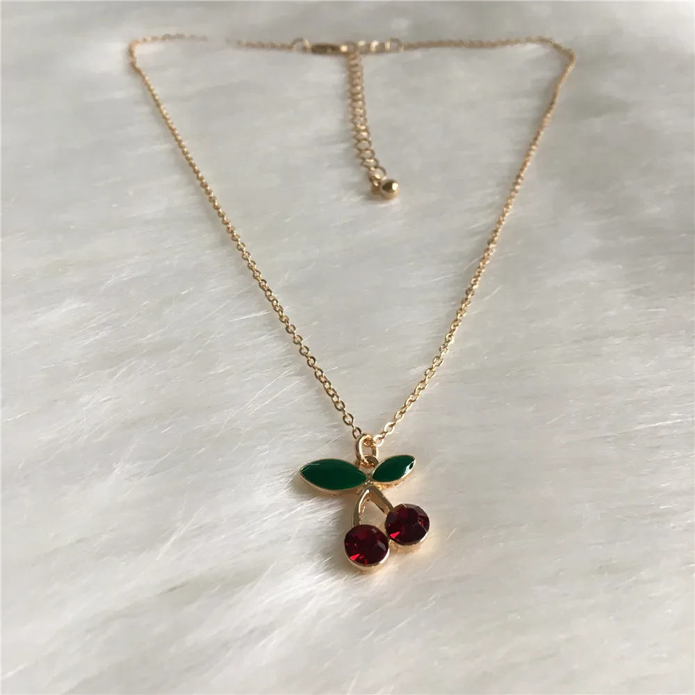 SWEET GOLD COLOR PLATING RED STONE WITH GREEN ENAMEL CHERRY PENDANT NECKLACE FOR WOMEN GIRL
SWEET GOLD COLOR PLATING RED STONE WITH GREEN ENAMEL CHERRY PENDANT NECKLACE FOR WOMEN GIRL