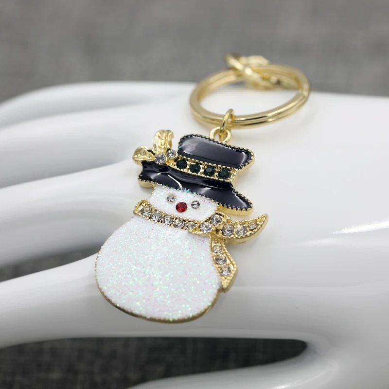 Christmas snowman key chain Christmas gift enameled bag with sweet girl pendant accessories
Christmas snowman key chain Christmas gift enameled bag with sweet girl pendant accessories