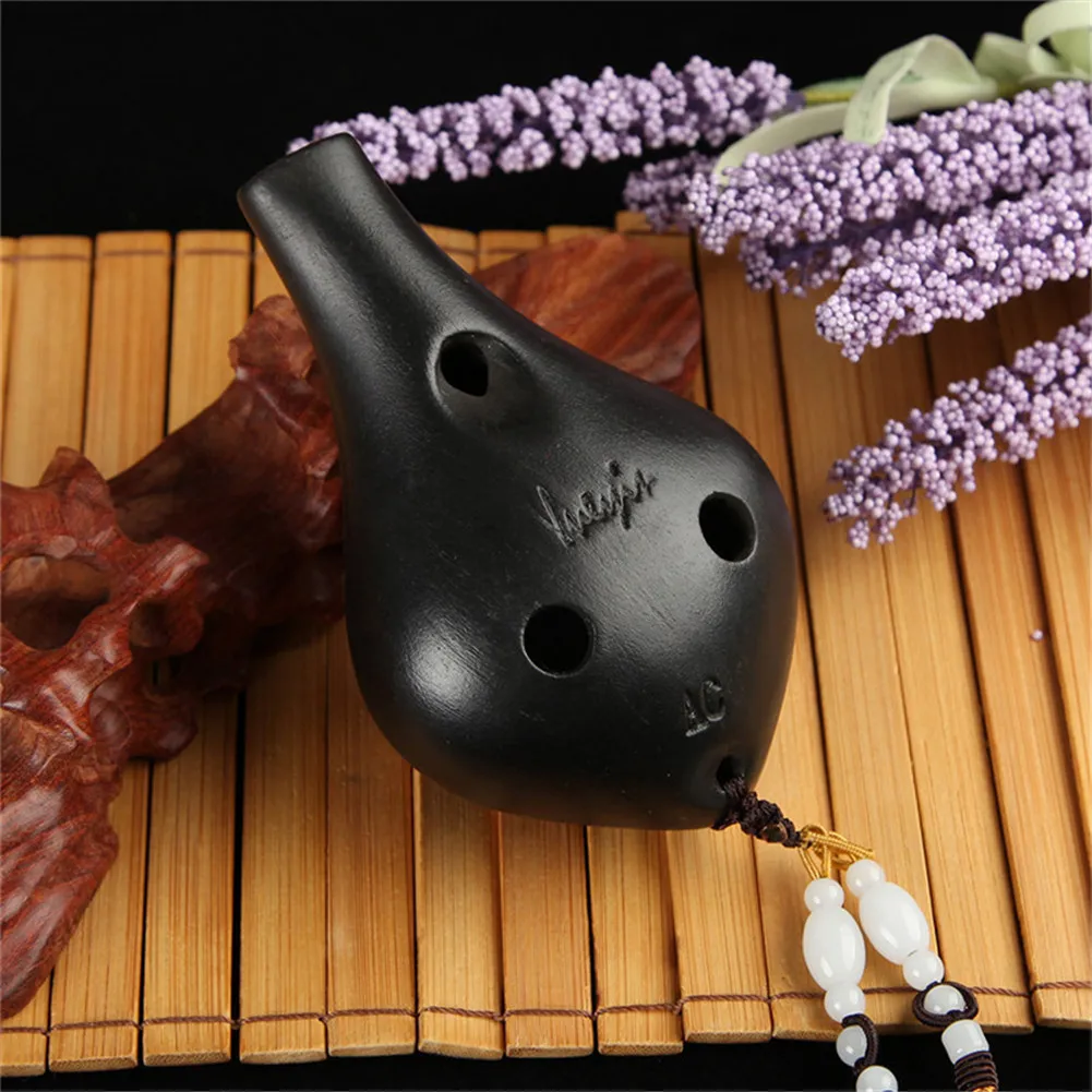 Porcelain Pottery Black Ocarina Flute 6 Holes Ocarina Alto C AC Ceramic Orff Woodwind Instrument
Porcelain Pottery Black Ocarina Flute 6 Holes Ocarina Alto C AC Ceramic Orff Woodwind Instrument