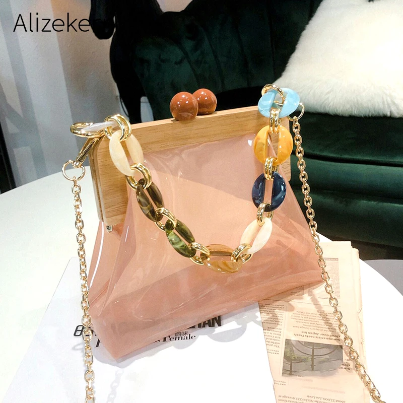 Wood Clip PVC Clear Jelly Handbag Woman 2019 New Designer Korean Acrylic Chain Transparent Jelly Shoulder Bag Clutch Female Wood Clip PVC Clear Jelly Handbag Woman 2019 New Designer Korean Acrylic Chain Transparent Jelly Shoulder Bag Clutch Female