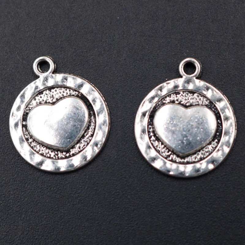 WKOUD 10pcs Antique Silver Heart-shaped Round Pendant Vintage Necklace Bracelet DIY Metal Jewelry Handmade Accessories A1815
WKOUD 10pcs Antique Silver Heart-shaped Round Pendant Vintage Necklace Bracelet DIY Metal Jewelry Handmade Accessories A1815