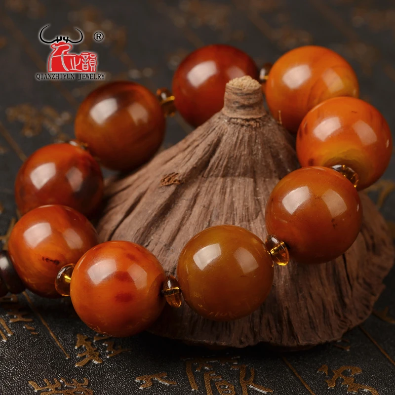 25mm natural black flower yak horn blood silk is round bucket bead hand string high-quality DIY bone bracelet.
25mm natural black flower yak horn blood silk is round bucket bead hand string high-quality DIY bone bracelet.