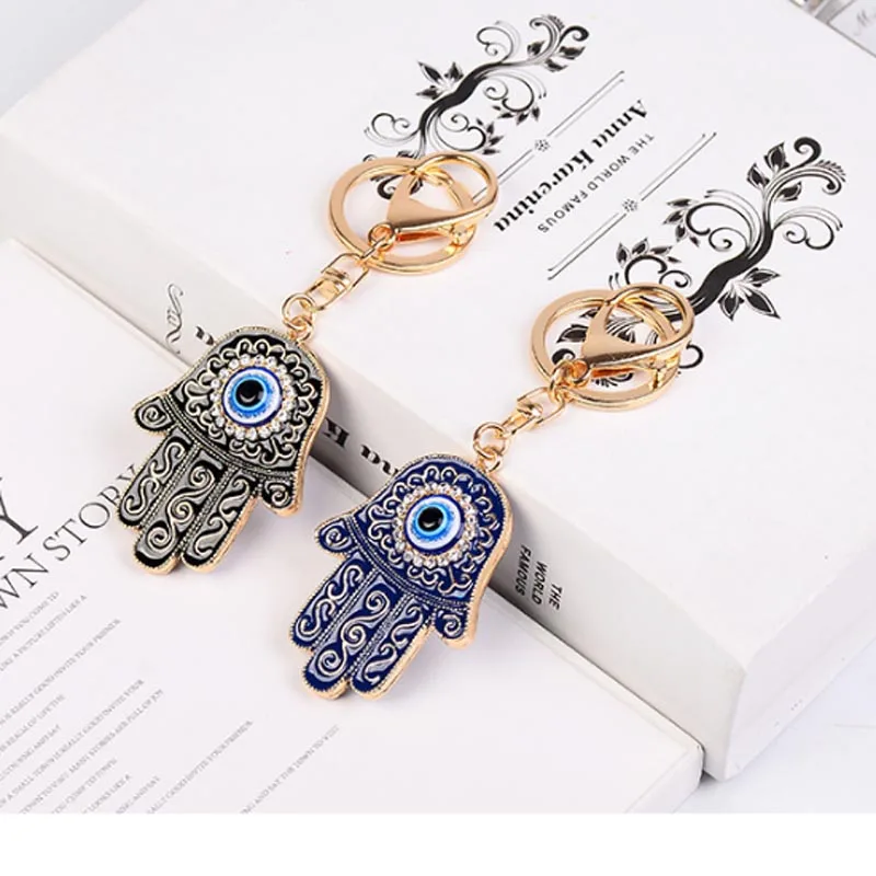Fashion Keychain Rhinestone Hand Eye Metal Key Chains Ring Holder Charm Crystal Palm Keyring Purse Pendant Key Holder CH993
Fashion Keychain Rhinestone Hand Eye Metal Key Chains Ring Holder Charm Crystal Palm Keyring Purse Pendant Key Holder CH993