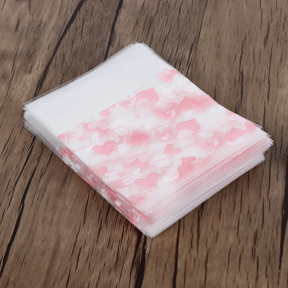 100Pcs/Pack New Useful Heart Print Pattern Self Adhesive DIY Plastic Cookie Package Food Bags Candy Christmas Party Gifts Bag
100Pcs/Pack New Useful Heart Print Pattern Self Adhesive DIY Plastic Cookie Package Food Bags Candy Christmas Party Gifts Bag