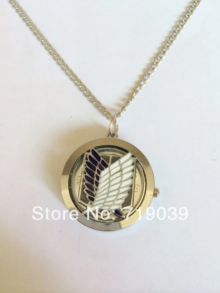 2014 Hot Fashion silver charm Movie jewelry Attack on Titan survey corps side flip anime pocket watch necklace factory price
2014 Hot Fashion silver charm Movie jewelry Attack on Titan survey corps side flip anime pocket watch necklace factory price