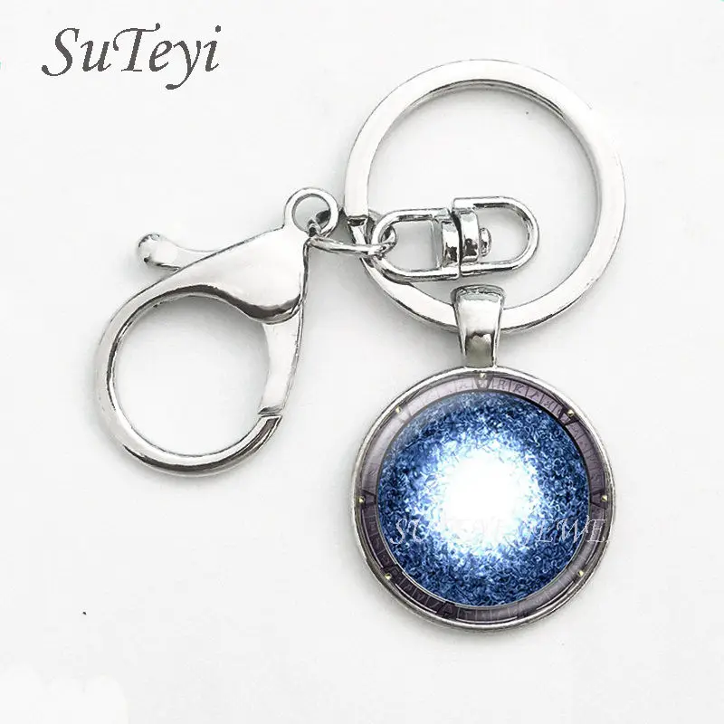 SUTEYI 12 Styles New Stargate Portal Pendant Key ring Stargate Glass Cabochon Portal Atlantis Key chain Jewelry for women
SUTEYI 12 Styles New Stargate Portal Pendant Key ring Stargate Glass Cabochon Portal Atlantis Key chain Jewelry for women