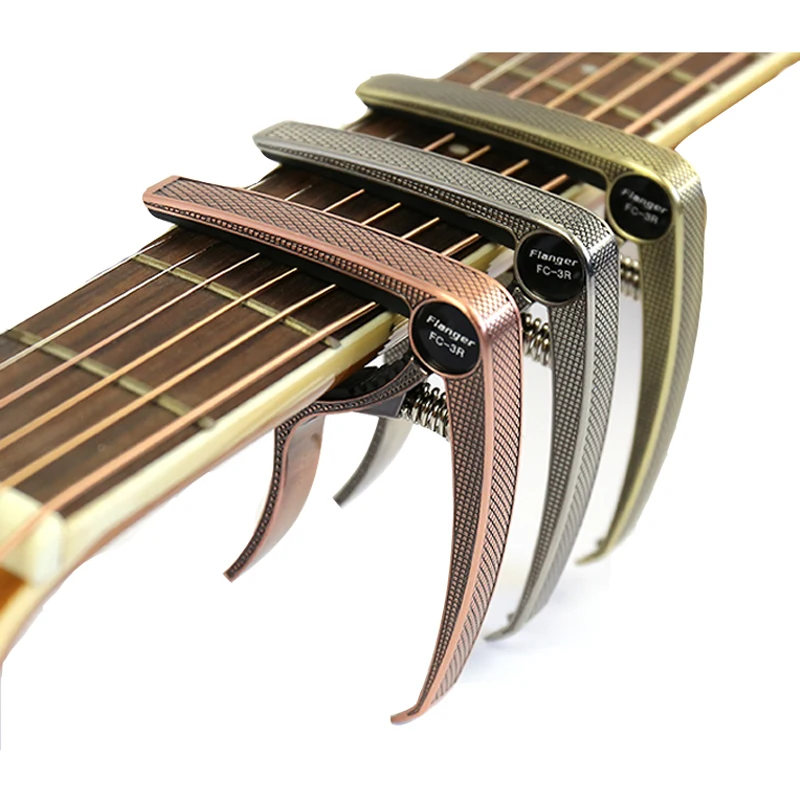 Zinc Alloy Capo for Acoustic Classic Electric Guitarra Tuning Clamp Musical Instrument Accessories Grid Guitar Parts FC-3R
Zinc Alloy Capo for Acoustic Classic Electric Guitarra Tuning Clamp Musical Instrument Accessories Grid Guitar Parts FC-3R