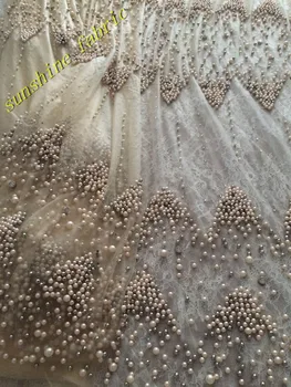 wholeslae pearls lace fabric High Quality African french Lace fabric african tulle beaded lace Fabric for wedding dress 
wholeslae pearls lace fabric High Quality African french Lace fabric african tulle beaded lace Fabric for wedding dress