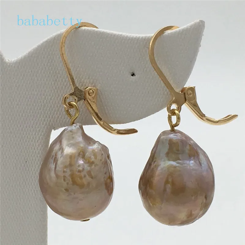new 12 x18mm purple baroque real natural pearl 925 sterling silver fashion earrings
new 12 x18mm purple baroque real natural pearl 925 sterling silver fashion earrings