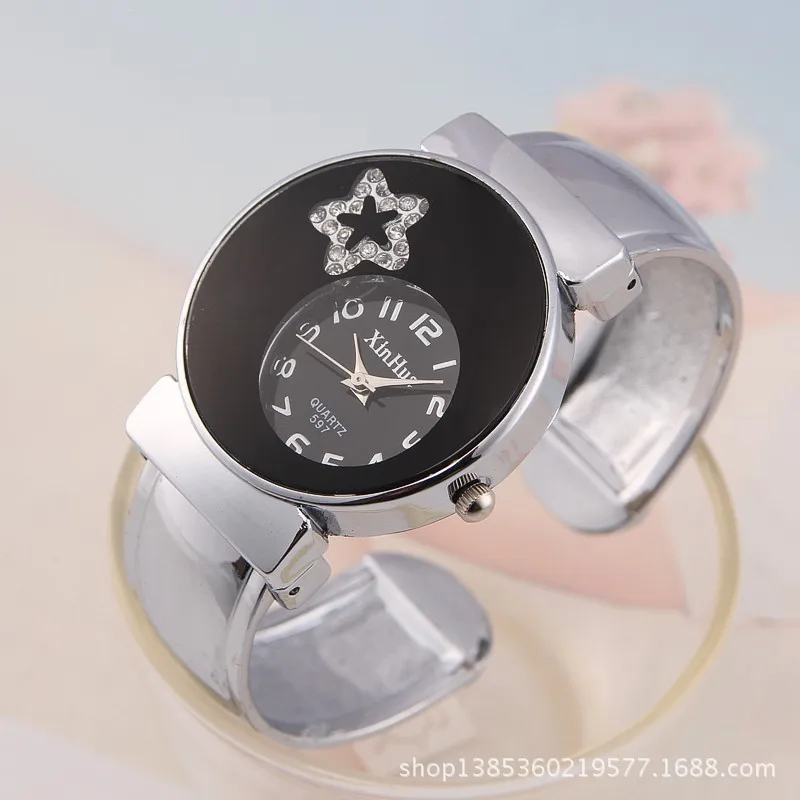 Brand Rhinestone Five-pointed Star Vogue Full Stainless Steel Clocks Women Round Dial Bracelet Analog Wrist Watch Dress Watches
Brand Rhinestone Five-pointed Star Vogue Full Stainless Steel Clocks Women Round Dial Bracelet Analog Wrist Watch Dress Watches