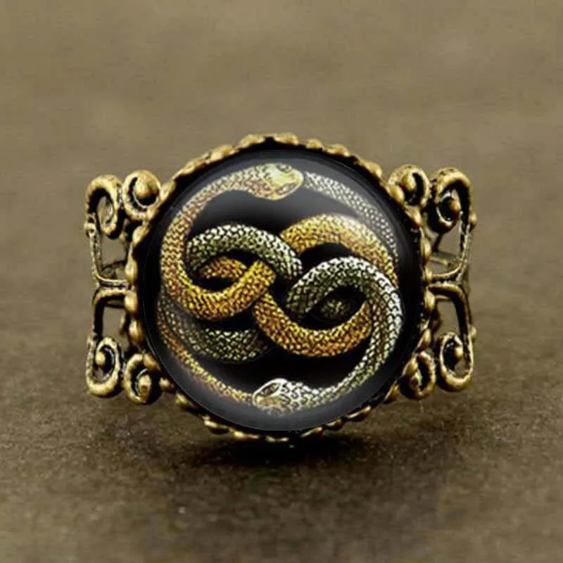 2017 New Neverending Story Hogwarts Slytherin Crest Ring Jewelry Link Ring Glass Dome
2017 New Neverending Story Hogwarts Slytherin Crest Ring Jewelry Link Ring Glass Dome