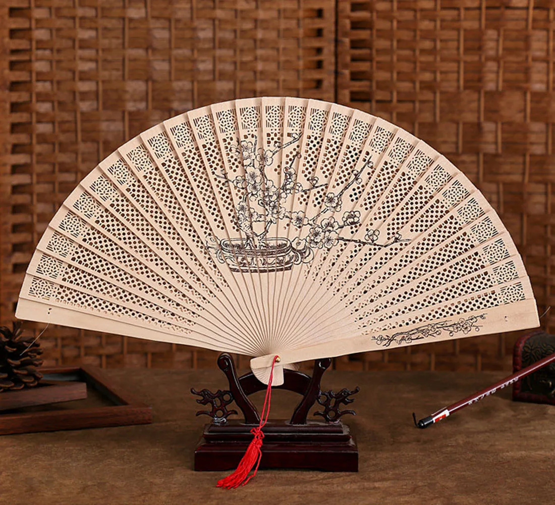 Chinese traditional hollow fan sandalwood handmade beautifully female folding craft folded wedding gift Y46
Chinese traditional hollow fan sandalwood handmade beautifully female folding craft folded wedding gift Y46