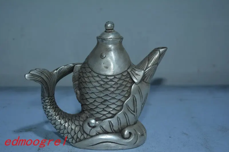 Old Chinese Tibet silver fish teapot, Hand-carved crafts,Auspicious evil-proof ornaments,,collection& adornment,free shipping
Old Chinese Tibet silver fish teapot, Hand-carved crafts,Auspicious evil-proof ornaments,,collection& adornment,free shipping