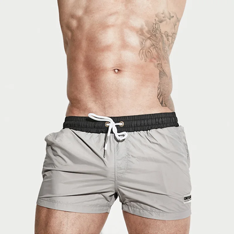 A505 7 colors summer men beach shorts swimwear quick dry swim trunk shorts men swimsuit sunga sports fitness leisure briefs
A505 7 colors summer men beach shorts swimwear quick dry swim trunk shorts men swimsuit sunga sports fitness leisure briefs