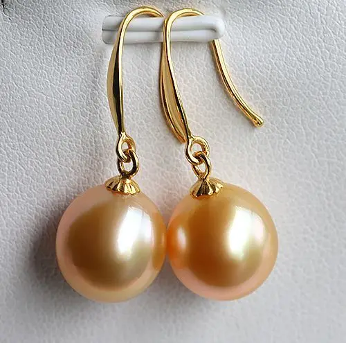 Beautiful a pair 10-11mm AAA south sea gold pink round pearl dangle earrings14KGP
Beautiful a pair 10-11mm AAA south sea gold pink round pearl dangle earrings14KGP
