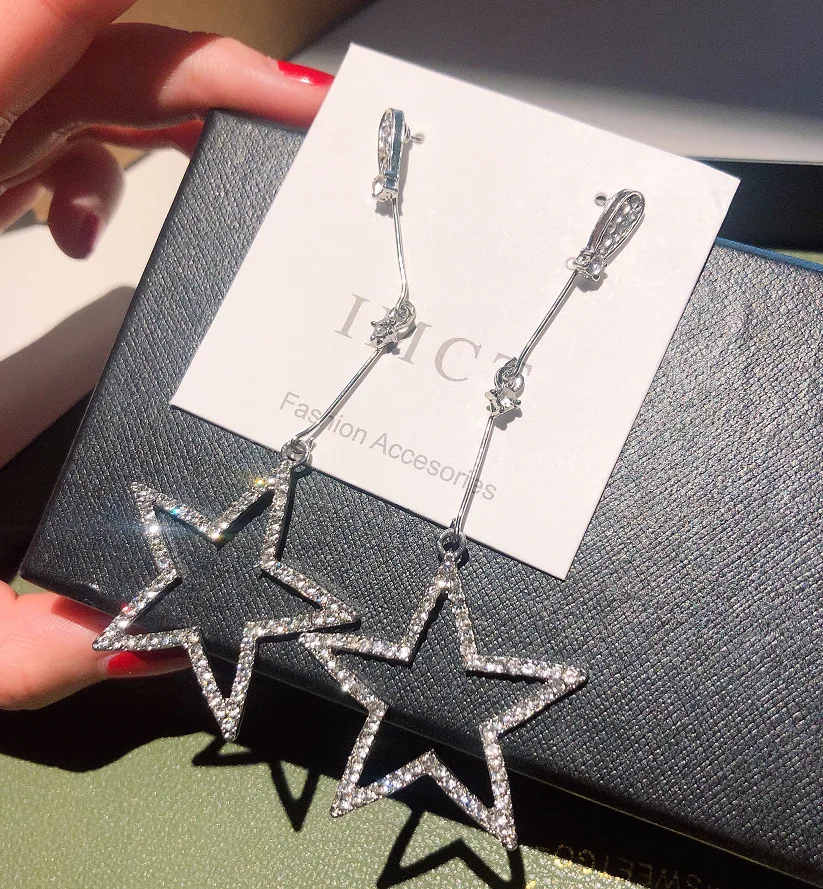 2019 New Fashion Brincos Crystal Rhinestone Hollow Five-pointed Star Hanging Earrings Femeal Fashion Jewelry Oorbellen
2019 New Fashion Brincos Crystal Rhinestone Hollow Five-pointed Star Hanging Earrings Femeal Fashion Jewelry Oorbellen