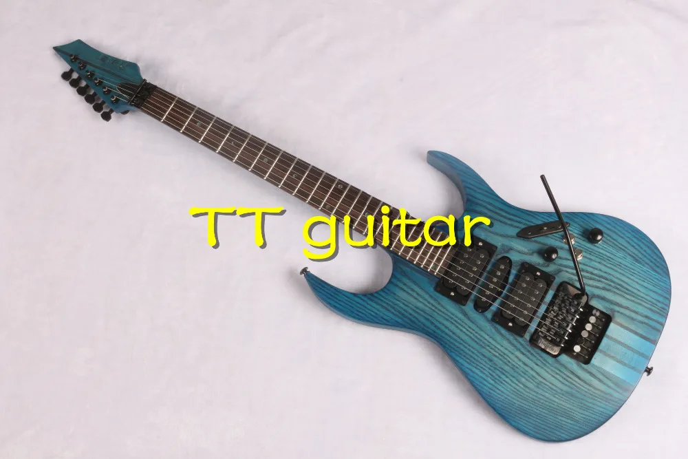 2016 6 Strings ocean blue color ash body one-piece set neck black hardware Locking China Electric Guitar
2016 6 Strings ocean blue color ash body one-piece set neck black hardware Locking China Electric Guitar