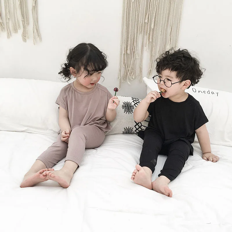 Summer Children Pure Color Set Boys and Girls Home Clothing Baby Short Sleeved Tops with Trousers Air Conditioning Clothing Sets
Summer Children Pure Color Set Boys and Girls Home Clothing Baby Short Sleeved Tops with Trousers Air Conditioning Clothing Sets