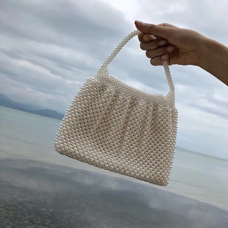 ARPIMALA Pearls Tote Bag Handmade Beading Hand Bags Lady Elegant White Evening Bag High Quality Fashion Clutch Diamonds Handbags
ARPIMALA Pearls Tote Bag Handmade Beading Hand Bags Lady Elegant White Evening Bag High Quality Fashion Clutch Diamonds Handbags