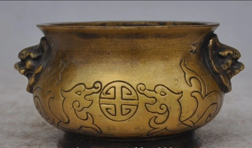 Marked Chinese bronze foo dog beast head dragon statue incense burner Censer
Marked Chinese bronze foo dog beast head dragon statue incense burner Censer