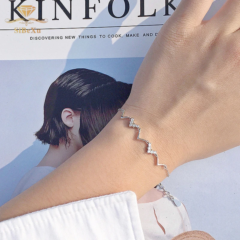 Fashion 925 Sterling Silver Bracelet Women Crystal Element Charming Heart Wave Bangles Zircon Jewelry Gift
Fashion 925 Sterling Silver Bracelet Women Crystal Element Charming Heart Wave Bangles Zircon Jewelry Gift