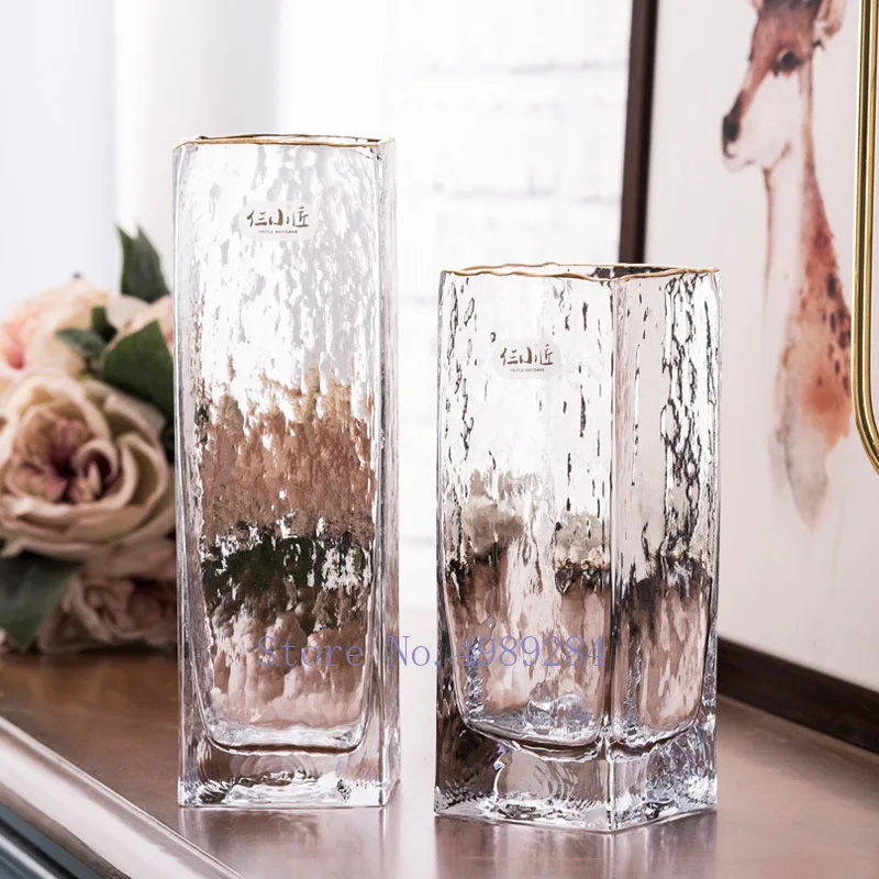 Creative Hammer pattern glass Golden rim vase Nordic Flower arrangement Flower vase Decorative ornaments Modern home decoration
Creative Hammer pattern glass Golden rim vase Nordic Flower arrangement Flower vase Decorative ornaments Modern home decoration