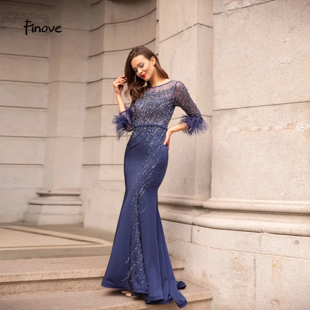 Finove Navy Blue Evening Dress 2019 New Arrivals Elegant Beading Feathers O-Neck Illusion Back Floor Length Formal Party Gowns
Finove Navy Blue Evening Dress 2019 New Arrivals Elegant Beading Feathers O-Neck Illusion Back Floor Length Formal Party Gowns