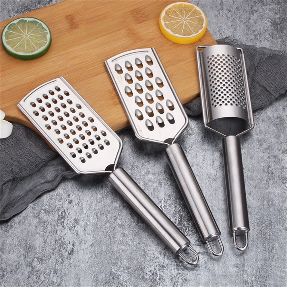 Multi Functional Stainless Steel Vegetable Fruit Graters Ginger Garlic Grinding Grater Hole Planer Slicer Cutter Cooking Tool
Multi Functional Stainless Steel Vegetable Fruit Graters Ginger Garlic Grinding Grater Hole Planer Slicer Cutter Cooking Tool