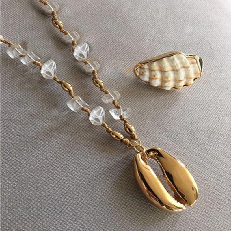 Natural large shell gold necklace pure hand knotted woven transparent crystal necklace bohemian women summer hot selling
Natural large shell gold necklace pure hand knotted woven transparent crystal necklace bohemian women summer hot selling