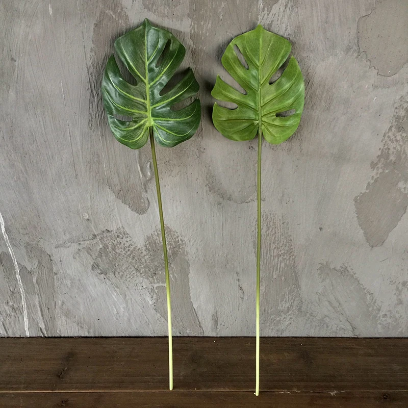 Artificial Palm Tree Leaves Flower Branch Real touch Plastic Latex Coating Monstera Leaf Plant for Home Garden Decoration
Artificial Palm Tree Leaves Flower Branch Real touch Plastic Latex Coating Monstera Leaf Plant for Home Garden Decoration