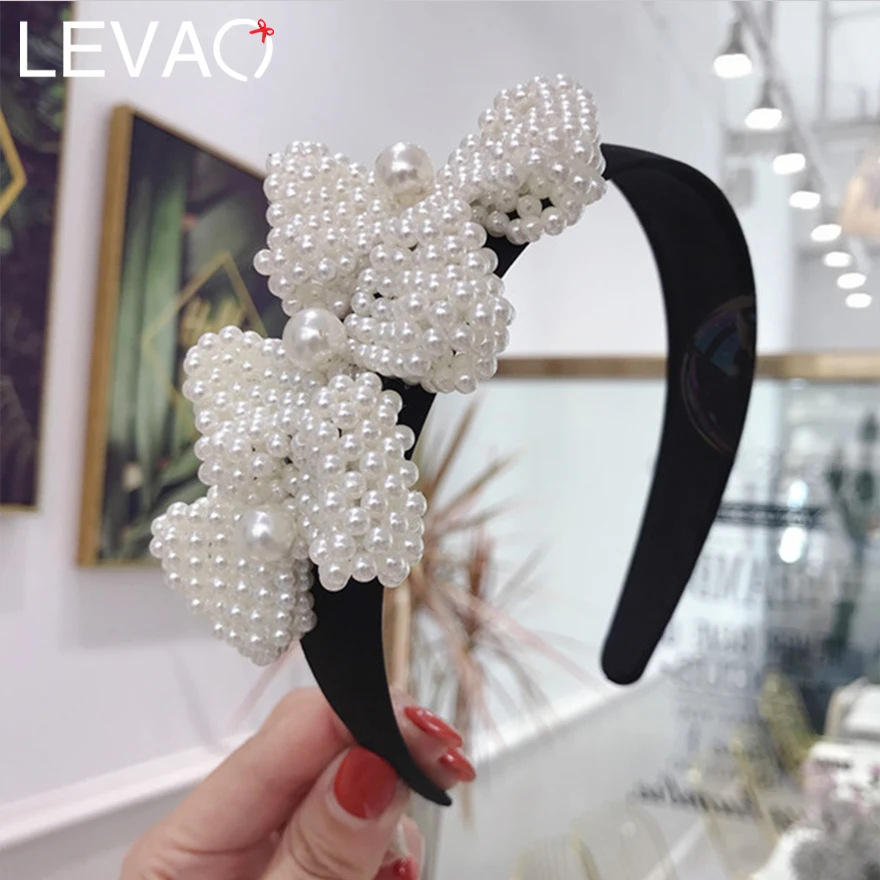 Levao Korean Handmade Pearls Beads Bow Knot Headband for Lovely Girls Simple Fashion Black Plastic Wide-edged Women Hairbands
Levao Korean Handmade Pearls Beads Bow Knot Headband for Lovely Girls Simple Fashion Black Plastic Wide-edged Women Hairbands
