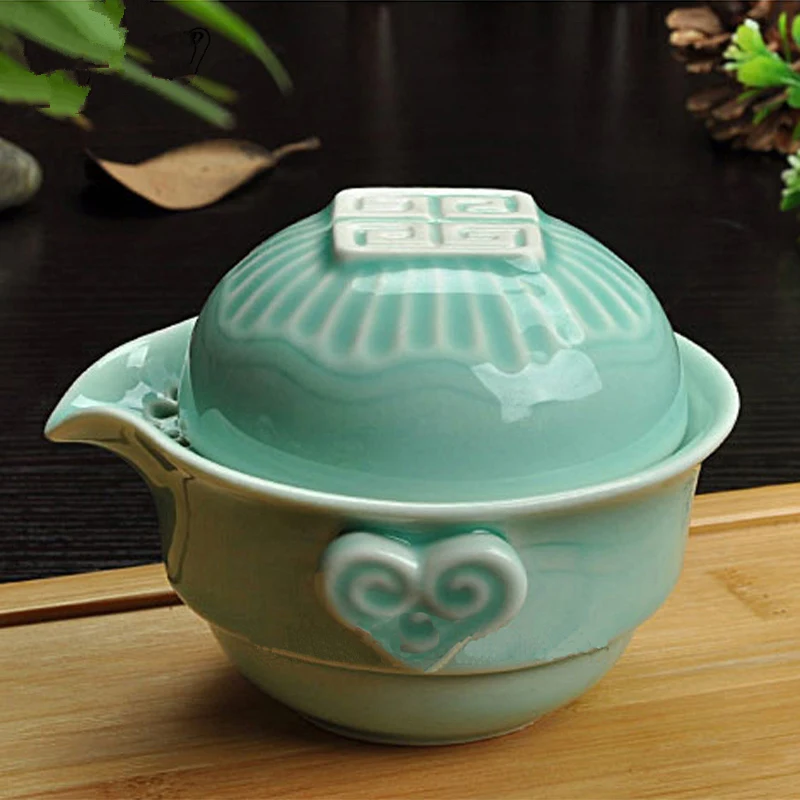 porcelain tea pot with infuser Chinese portable tea cup Longquan celadon ceramic pots of tea Chinese travelling tea set green
porcelain tea pot with infuser Chinese portable tea cup Longquan celadon ceramic pots of tea Chinese travelling tea set green