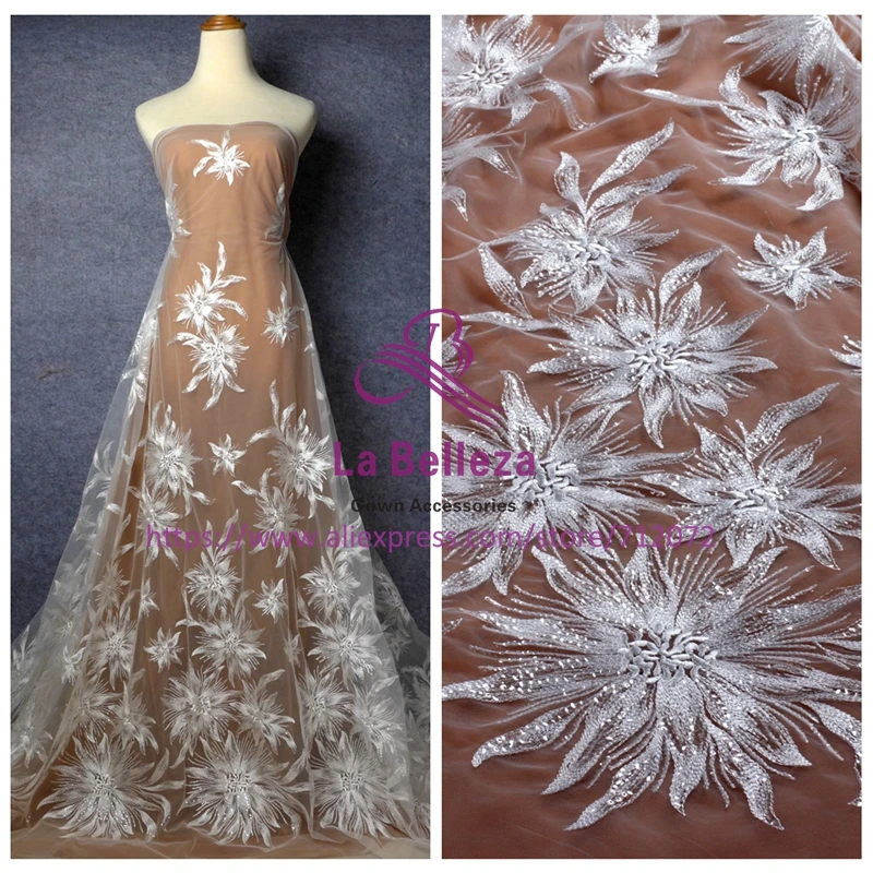 La Belleza Off white clear squins polyester on net embroidery wedding dress lace fabric 1 yard 51" width
La Belleza Off white clear squins polyester on net embroidery wedding dress lace fabric 1 yard 51" width