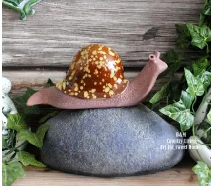 Garden snail ceramic decoration garden patio balcony wall hanging decoration landscape culpture statue
Garden snail ceramic decoration garden patio balcony wall hanging decoration landscape culpture statue
