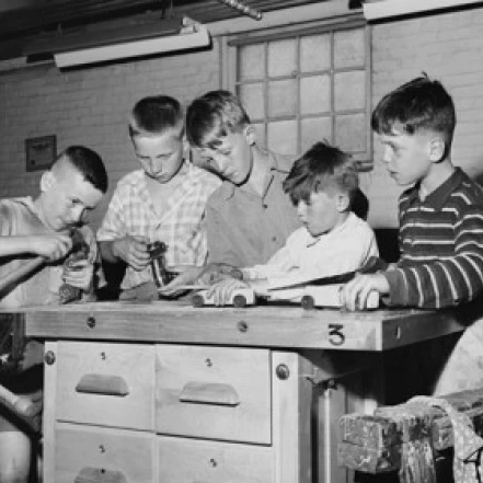 Five children making craft products in an arts and crafts class Poster Print (18 x 24)