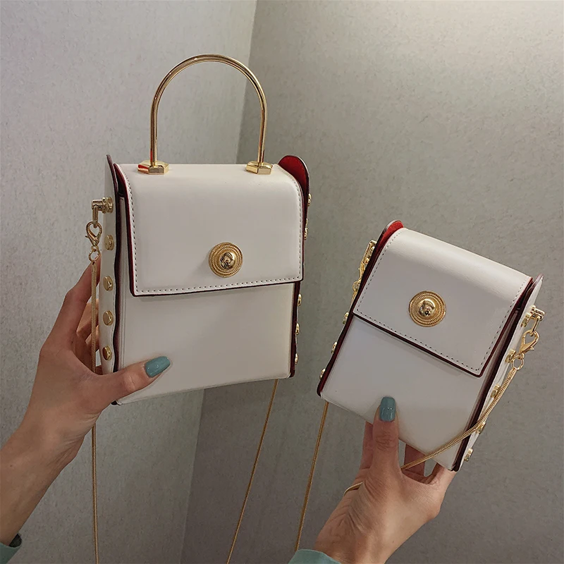 Small bucket Rivet chain women bag Mobile phone messenger 2019 new leather shoulder crossbody handbag designer lady luxury brand
Small bucket Rivet chain women bag Mobile phone messenger 2019 new leather shoulder crossbody handbag designer lady luxury brand
