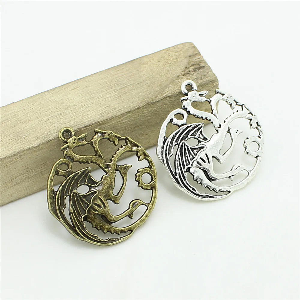 Sweet Bell Antique Silver Metal Alloy Game of Thrones Dragon Jewelry Pendant Charms Animal Charm 12pcs/lot 33*35mm 3C422
Sweet Bell Antique Silver Metal Alloy Game of Thrones Dragon Jewelry Pendant Charms Animal Charm 12pcs/lot 33*35mm 3C422