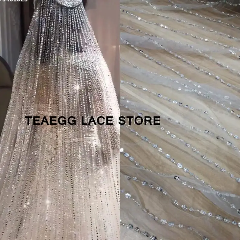 Vintage beading lace fabric shining sequins beading line embroidery lace for gown wedding dress and party dress 130cm width
Vintage beading lace fabric shining sequins beading line embroidery lace for gown wedding dress and party dress 130cm width