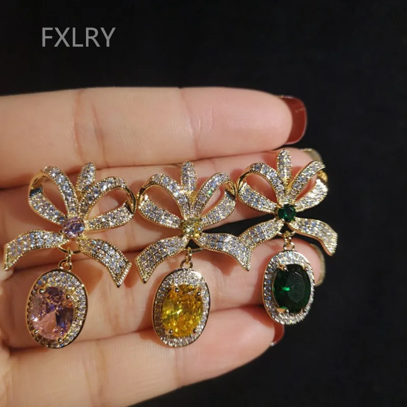 FXLRY Hot sale Luxury Fashion Gold Color Cubic Zirconia Bowknot Big Pink Crystal Stone Drop Earrings for Women Jewelry
FXLRY Hot sale Luxury Fashion Gold Color Cubic Zirconia Bowknot Big Pink Crystal Stone Drop Earrings for Women Jewelry