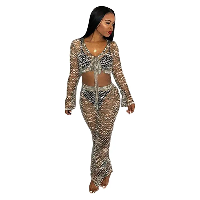 Hollow Out Fishnet Sexy 2 Piece Set Women Long Sleeve See Through Mesh Crop Top and Wide Leg Pants Set Beach Two Piece Outfits
Hollow Out Fishnet Sexy 2 Piece Set Women Long Sleeve See Through Mesh Crop Top and Wide Leg Pants Set Beach Two Piece Outfits