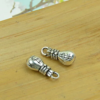 free shipping 100pcs/lot A1337 antique silver dollar shape alloy charm pendant fit jewelry making 16x7mm wholesale 
free shipping 100pcs/lot A1337 antique silver dollar shape alloy charm pendant fit jewelry making 16x7mm wholesale