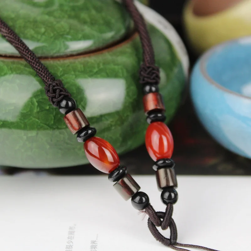 KYSZDL original design Handmade rope Using the pendant match Red stone beads and wood
KYSZDL original design Handmade rope Using the pendant match Red stone beads and wood