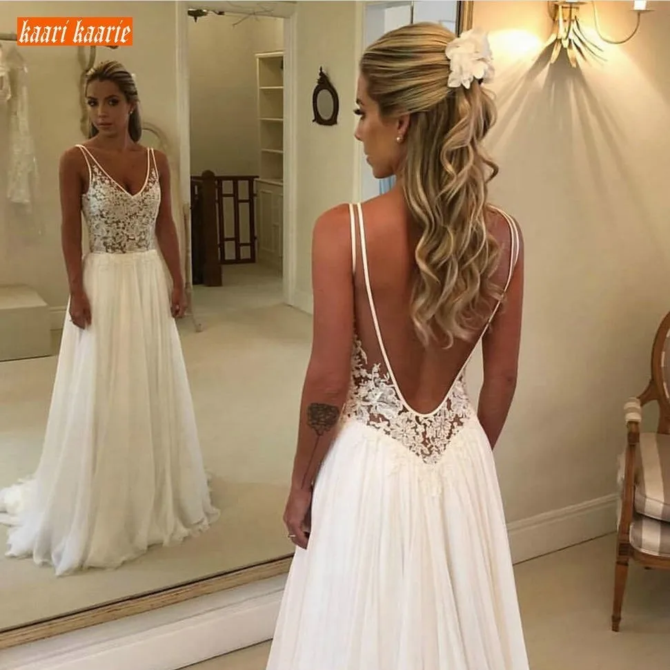 Elegant Boho V Neck Bride Dresses Long 2020 New Chiffon Backless Wedding Gowns Sleeveless Appliques Top Lace Beach Wedding Dress
Elegant Boho V Neck Bride Dresses Long 2020 New Chiffon Backless Wedding Gowns Sleeveless Appliques Top Lace Beach Wedding Dress