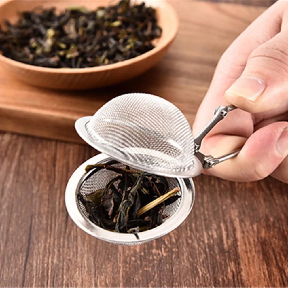 Stainless Steel Sphere Mesh Tea Infuser Ball Shape Tea Pot Infuser Filter Loose Tea Leaves Strainer With Handle Kitchen Bar Tool
Stainless Steel Sphere Mesh Tea Infuser Ball Shape Tea Pot Infuser Filter Loose Tea Leaves Strainer With Handle Kitchen Bar Tool