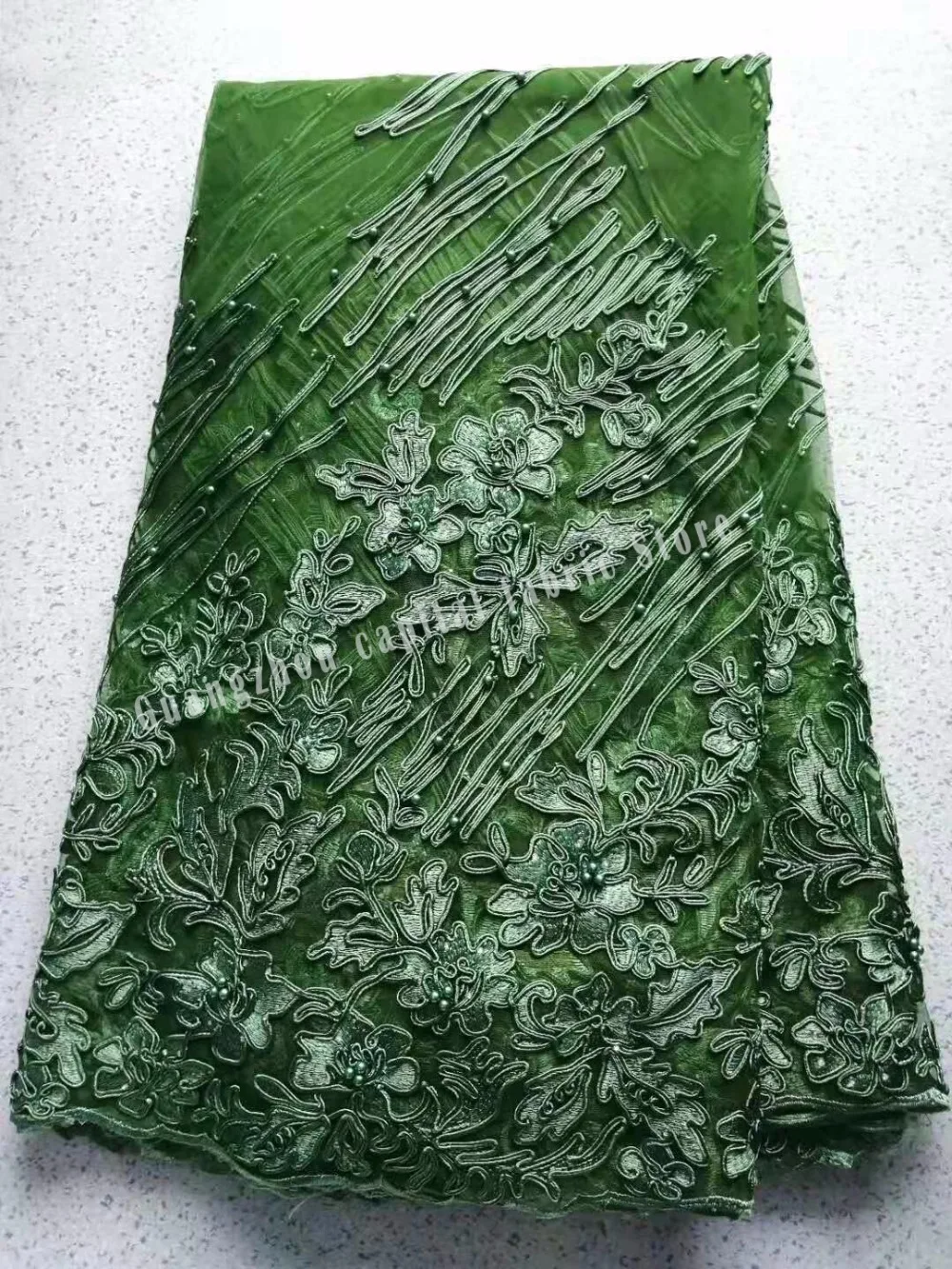 Africa's new green elegant high quality rope embroidery edge and beads fabric, fashionable and beautiful party dress
Africa's new green elegant high quality rope embroidery edge and beads fabric, fashionable and beautiful party dress