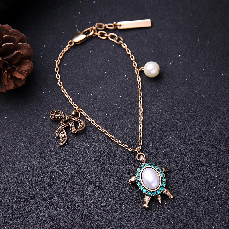 Crystal Bowknot Cute Turtle Animal Bracelet Female Acrylic Pearl Bead Fashion Retro Bracelet Factory Wholesale in box
Crystal Bowknot Cute Turtle Animal Bracelet Female Acrylic Pearl Bead Fashion Retro Bracelet Factory Wholesale in box