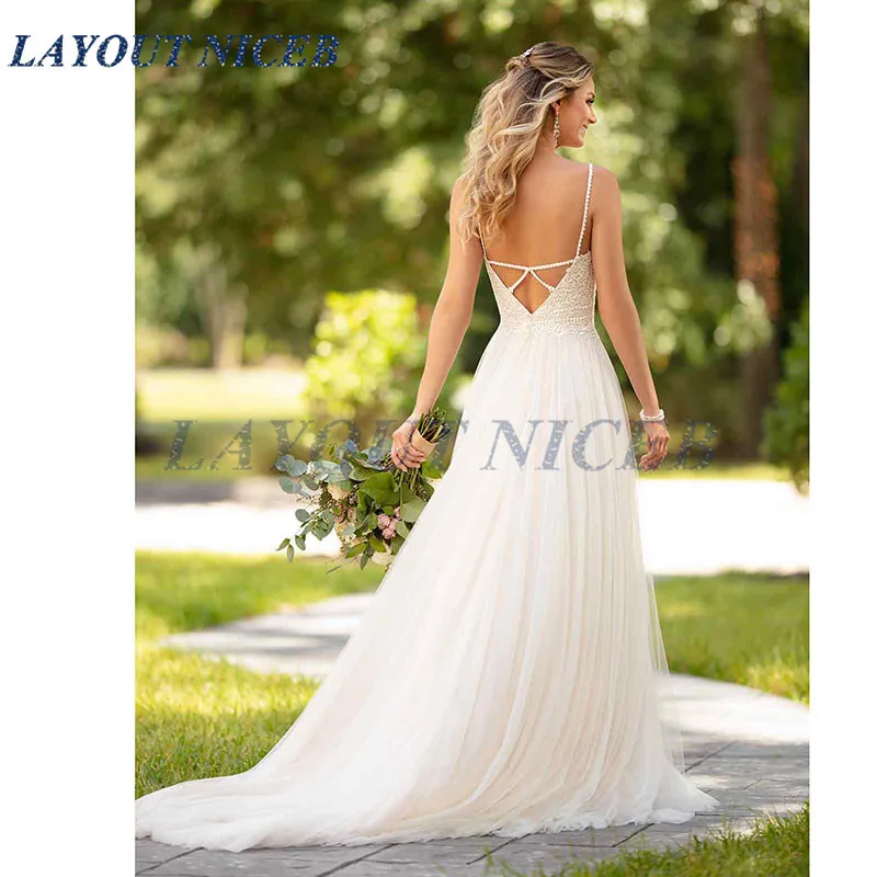 New Summer Beach Wedding Dresses A Line Tulle Wedding Gown Appliques Lace Beaded Spaghetti Strap Bridal Dress vestido novia
New Summer Beach Wedding Dresses A Line Tulle Wedding Gown Appliques Lace Beaded Spaghetti Strap Bridal Dress vestido novia