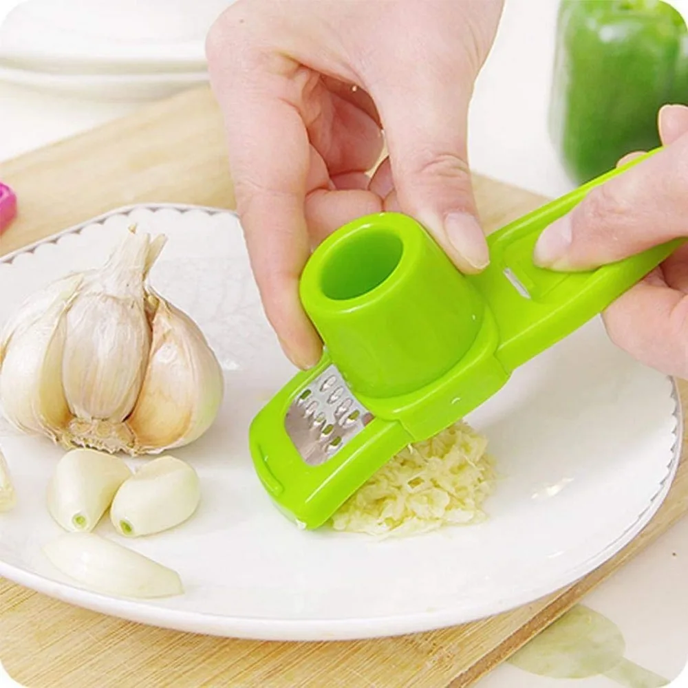 1 pcs Candy Color Garlic Press Multi-functional Grinding Garlic Mini Ginger Grinding Grater Planer Slicer Cutter Cooking Tools
1 pcs Candy Color Garlic Press Multi-functional Grinding Garlic Mini Ginger Grinding Grater Planer Slicer Cutter Cooking Tools